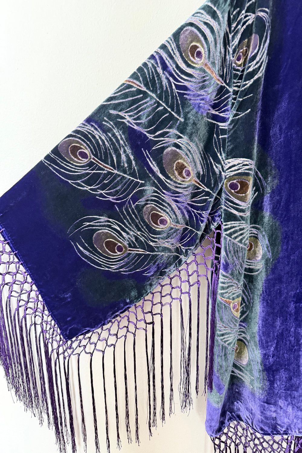 purple velvet silk jacket peacock feather pattern on a white background
